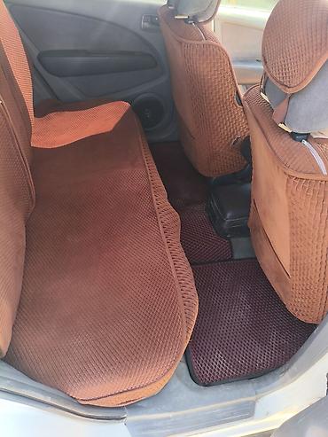 Транспорт: Mitsubishi Airtrek: 2001 г., 2.4 л, Универсал — 6