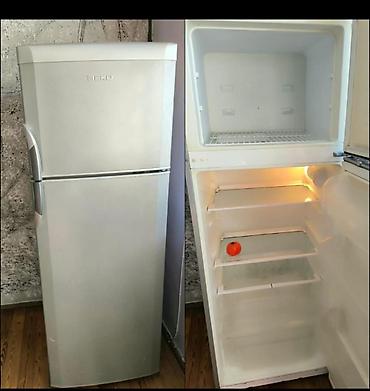 Beko markalı iki qapılı soyuducu - Üst kamerada dondurucu, alt