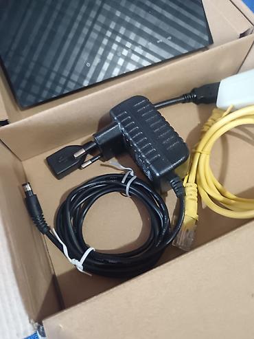 Модемы и сетевое оборудование: Маршрутизатор ASUS RT-N10U Wireless N150 Особенности: - Беспроводной — 3