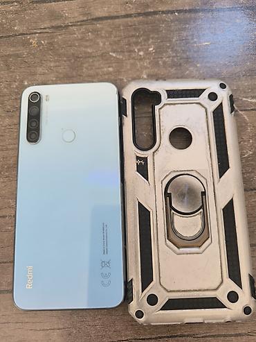 radiator islenmis: Xiaomi 32 GB, rəng - Mavi, 
 İki sim kartlı, Barmaq izi — 3