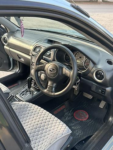 куго виш: Subaru Impreza: 2004 г., 1.5 л, Автомат, Бензин, Седан — 4