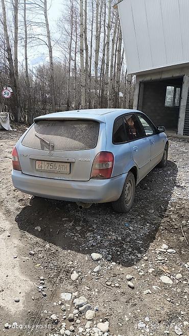 Унаа: Mazda 323: 2002 г., 1.6 л, Кол менен иштөөчү, Бензин, Универсал — 2