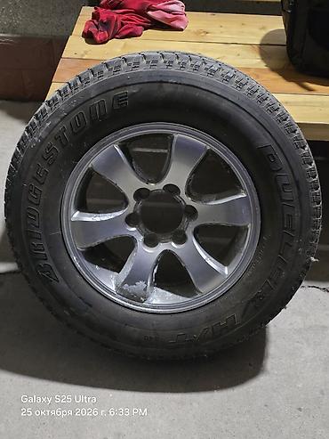 ленивец лентяй: Колесо в сборе: шина Bridgestone Dueler H/T на литом диске. 265/65R17 — 1