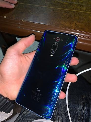 mi 15: Xiaomi Mi 9T, 128 GB, rəng - Göy, 
 Sensor, Barmaq izi, İki sim kartlı — 1