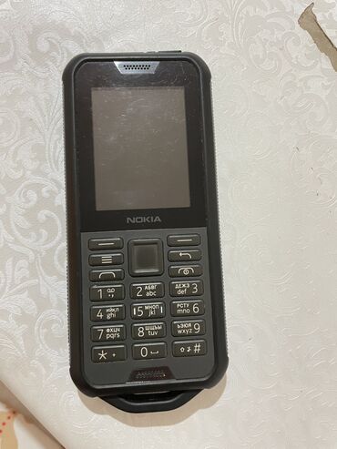 телефон баткен: Nokia 800C, Колдонулган, 4 GB, түсү - Боз, 1 SIM, 2 SIM