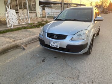 kia k5 qiymeti azerbaycanda: Kia Rio: 1.4 л | 2005 г. Хэтчбэк