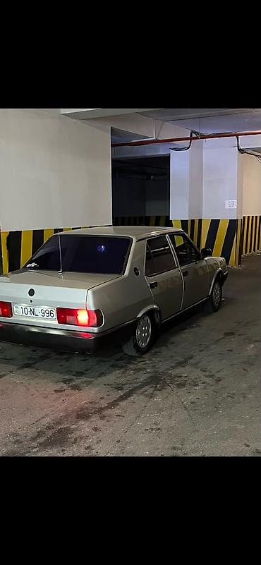 cankan masin: Model: Tofaş Dogan sedan Rəng: Gümüşü/boz, qara bamper və qoruyucu — 2