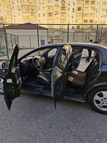 Opel: Model: Opel Astra G sedan Kuzov: 4 qapı, tünd yaşıl rəng Mühərrik və — 5