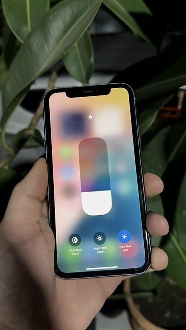 Mobil telefonlar: IPhone 11, Simsiz şarj — 4