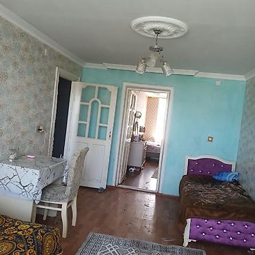 bina az əmircan: Seherin merkezinde 4 mertebeli binanon 3 cu mertebesi 3 otagli ev — 4