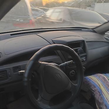 сузуки лиано: Suzuki Liana, серебристый хэтчбек/седан (KG номера 06 • 136 APV) — 2