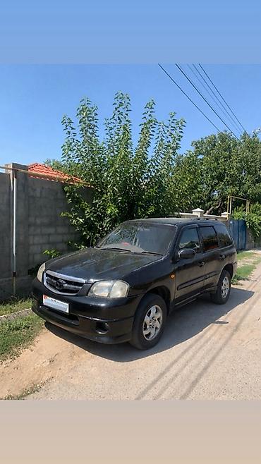 на кару: Mazda Tribute: 2000 г., 3 л, Автомат, Бензин, Кроссовер — 1