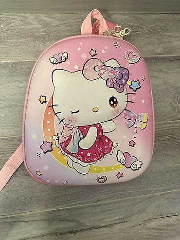 mekteb çantaları: Məhsul: Uşaq bel çantası – Hello Kitty temalı Xüsusiyyətlər: - Rəng — 1