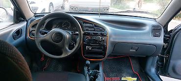 sukanlar: Daewoo Lanos: 1.5 l | 2011 il Sedan — 4