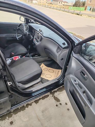 Kia: Kia Rio, qara rəng, hetçbek kuzov. Texniki xüsusiyyətlər və təchizat — 4