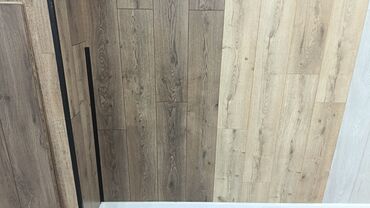 Laminat: Məhsul: Laminat döşəmə örtükləri və aksesuarları Təsvir: - Mağazada — 2