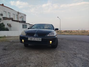 Mitsubishi: Mitsubishi Lancer: 1.3 l | 2006 il 300000 km — 16