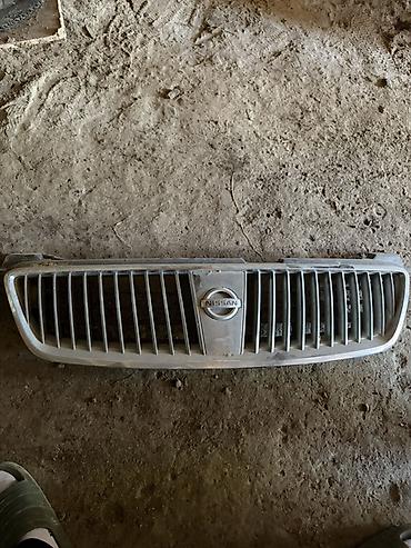 barmaqlıq: Nissan radiator barmaqlığı (orijinal) - Marka/model: Nissan (emblemli — 1