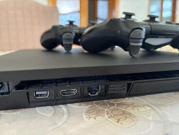 PS4 (Sony Playstation 4): Ps 4 slim 1TB . ev şəraitində işlənib ustada olmayıb. E football 2026