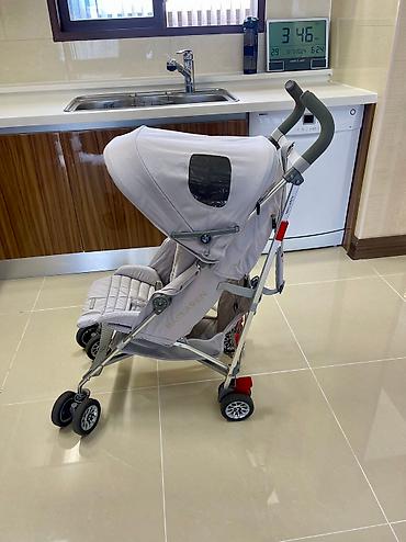 Коляски: Коляска премиум сегмента. Коляска-трость Maclaren BMW – это — 6