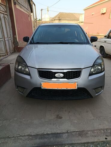Kia Rio: 1.5 л | 2010 г. Хэтчбэк