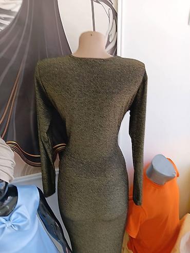 "massimo dutti" site:reddit.com site:twitter.com site:x.com site:wykop.pl site:tripadvisor.com site:youtube.com site:yelp.com site:booking.com site:facebook.com site:instagram.com site:tiktok.com: Ženska elegantna haljina – midi dužina, dugi rukavi, V-izrez. Model je — 4