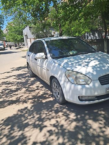 Hyundai: Hyundai Accent: 1.4 l | 2010 il Sedan — 9