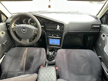 Daewoo: Daewoo Nexia: 2012 г., 1.6 л, Ручные, Бензин, Седан — 9