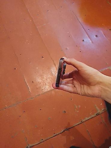 Apple iPhone: IPhone 14 Pro, Qara — 1