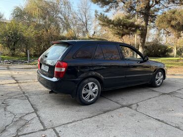 Mazda: Mazda 323: 2002 г., 1.6 л, Механика, Бензин, Хэтчбэк — 5