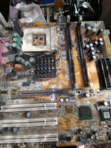 Материнские платы: Материнская плата — 7