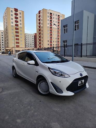 Транспорт: Toyota Aqua: 1.5 л | Хэтчбэк — 5
