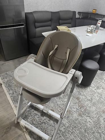 тракционый стол: Детский стульчик для кормления Maribel 3 в 1 с электрокачелей — 1