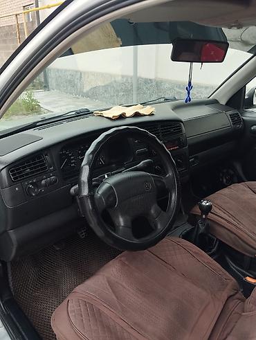 фама: Volkswagen Vento: 1995 г., 1.8 л, Механика, Бензин, Седан — 9