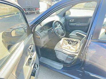 Kia: Kia Carens: 2005 г., Минивэн — 8