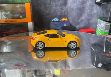 Avtomobil modelləri: Коллекционная модель Nissan 370Z Z34 yellow 2008 DeAgostini Scale — 5