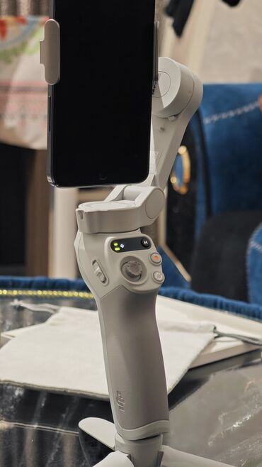 Telefon üçün stabilizatorlar: DJI Osmo Mobile SE stabilizatoru. Telefonu çəkmək və sabitləşdirmək