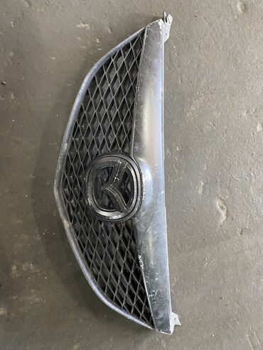 Решетки, облицовки: Решетка радиатора Mazda 2004 г., Б/у, Оригинал