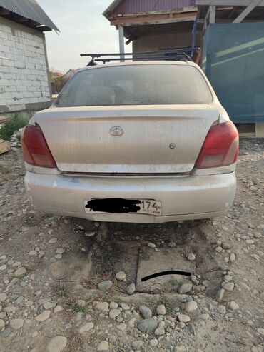 нексия гранат: Toyota Platz: 2000 г., 1.3 л, Автомат, Бензин, Седан