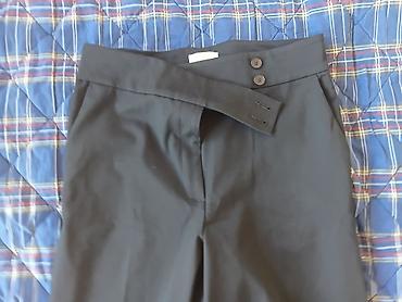 Pantalone: H&M Crne elegantne ženske pantalone sa širokom nogavicom. Model — 6