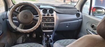багажник на крышу автомобиля: Daewoo Matiz – компактный городской автомобиль серебристого цвета с