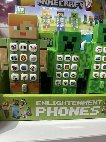 телефон игрушки: Детский музыкальный телефон-игрушка «Enlightenment Phones» в стиле — 2