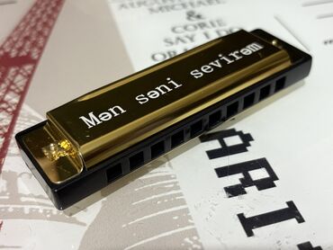 Dodaq qarmonları: Fərdi həkk olunmuş harmoniyalar. Bu harmoniyalar qızılı və gümüşü — 4