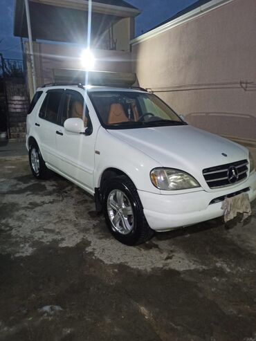 belarus 1025 qiymeti: Mercedes-Benz ML 320: 3.2 l | 2001 il Ofrouder/SUV