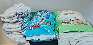 Paketi dečije odeće: Babylino Sensitive plus Pampers + Moony– paket pelena i pelena-gaćica — 7