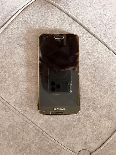 Смартфон Samsung Galaxy S5, цвет Gold. Основные характеристики: -
