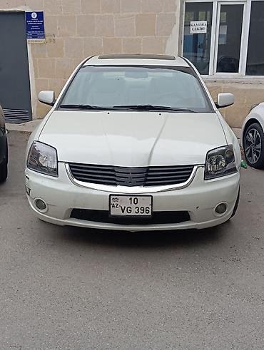mitsubisi: Mitsubishi Galant sedan Xüsusiyyətlər: - Kuzov: ağ rəngli sedan, 4 — 7