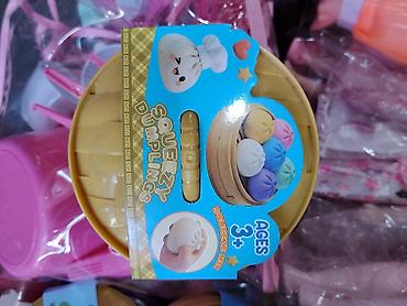 липкие шарики: Игрушка-антистресс Squeezy Dumplings - Набор мягких сжималок в виде — 1