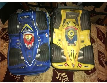 Uşaqlar üçün "Formula 1" avtomobili dizaynında olan təkərli çamadan