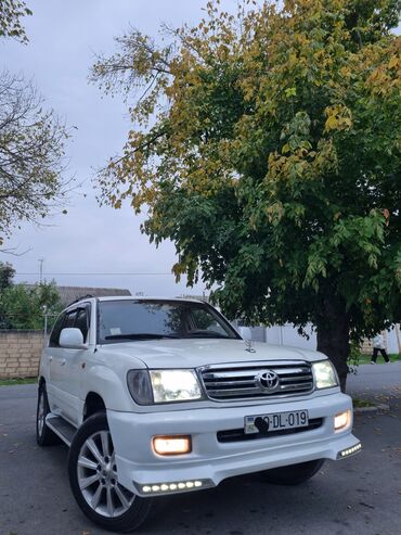 Toyota: Toyota Land Cruiser 2002 – baxımlı, əziyyət görməyib. Ağ rəngdədir — 15